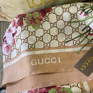 Authentic 100% silk rose gold floral scarf NWT, bag and box by 70” by 35” 1/2 W.